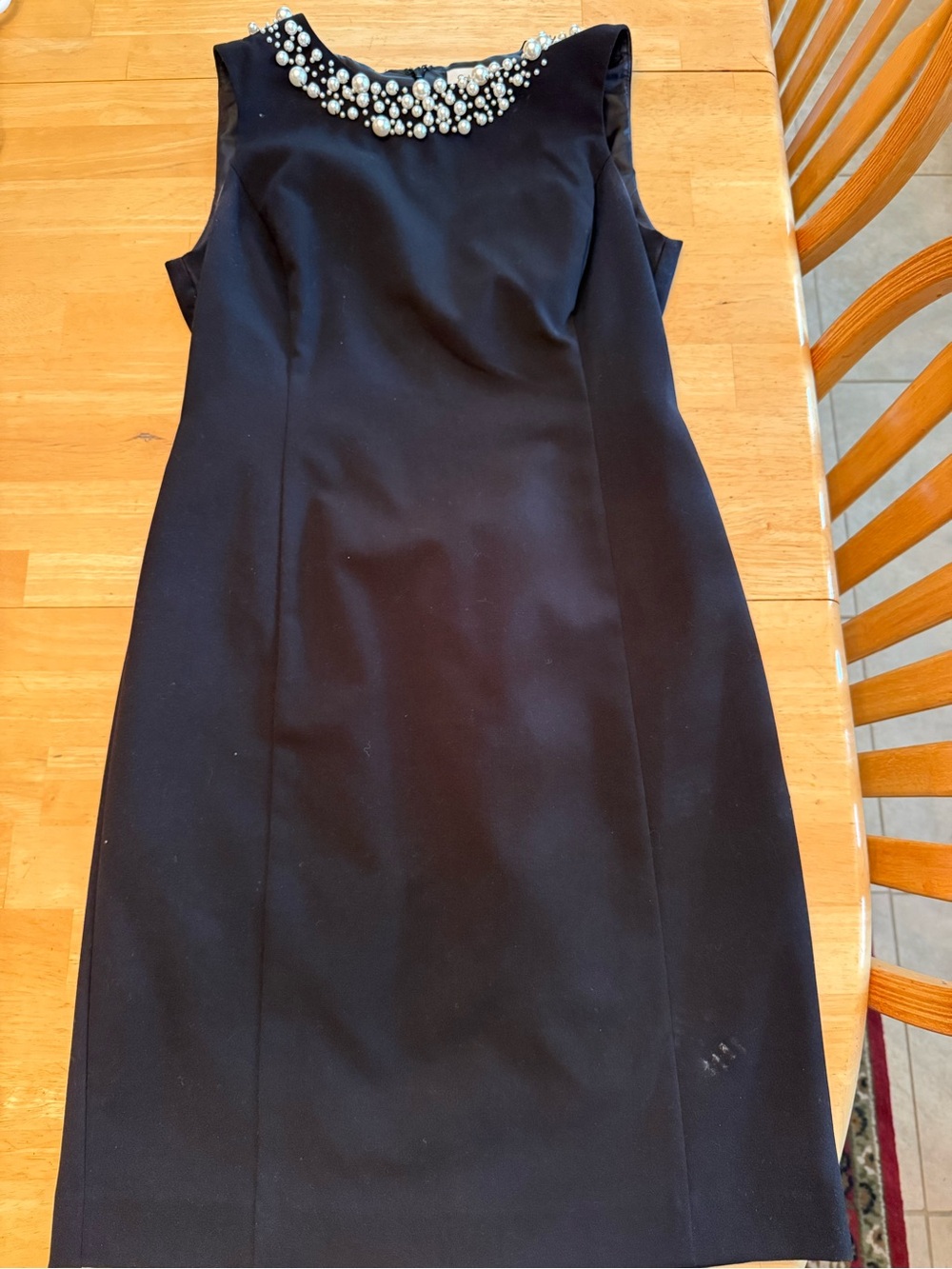 Sleeveless Calvin Klein Black Dress with Pearl-Embellished Neckline
